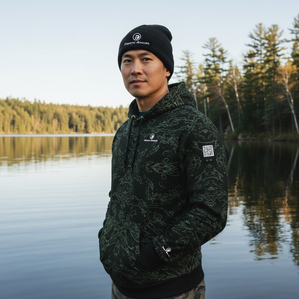 Ryo wearing the Fanatic Angler Diatom Green Hoodie – premium fishing hoodie with branding