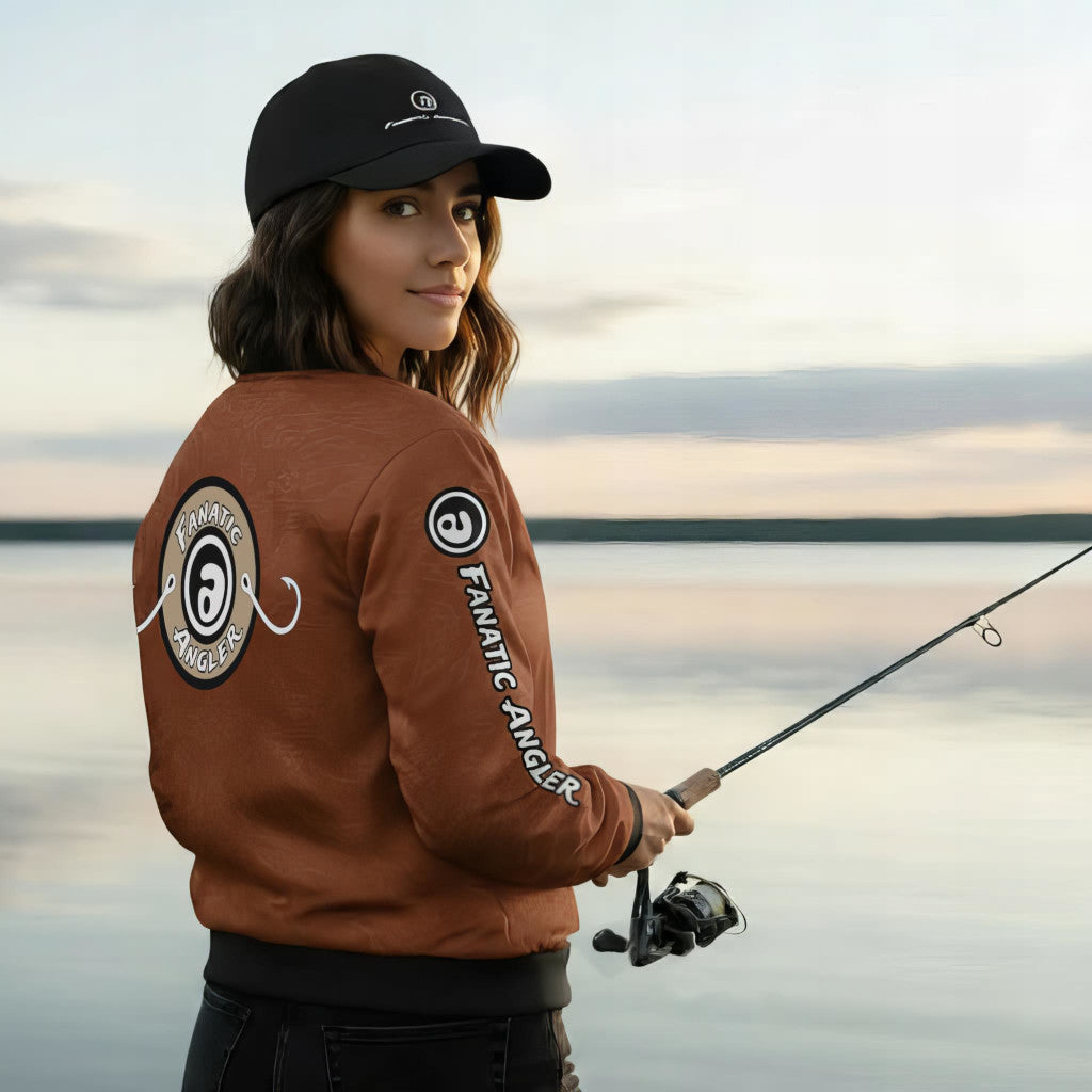 Elise wearing the Fanatic Angler Umber Stealth Edition Jacket – premium fishing jacket with branding