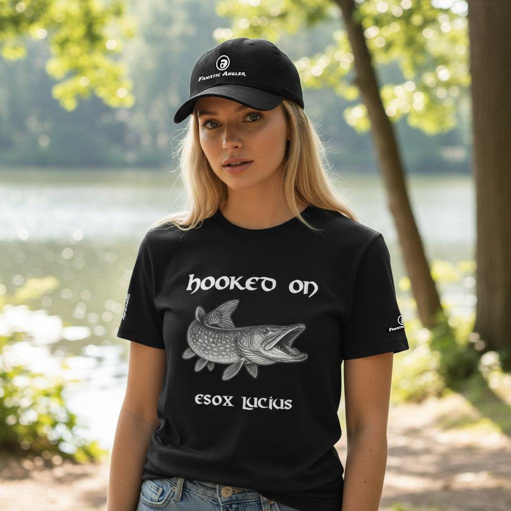 Hooked on Esox lucius (northern pike) fishing t-shirt – model Hailey wearing the premium black edition with branding detail