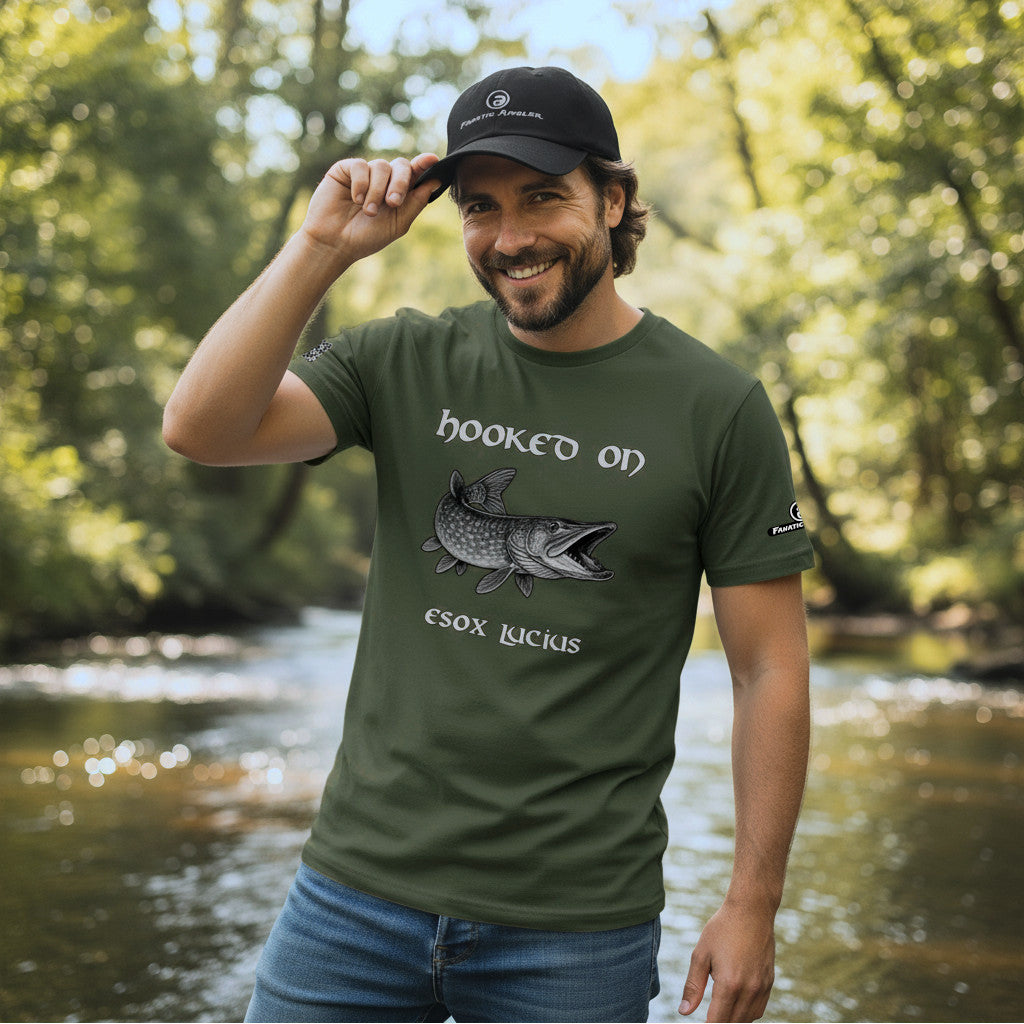 Hooked on Esox lucius (northern pike) fishing t-shirt – model Aegil wearing the premium Predator Green (military green) edition with branding detailbranding